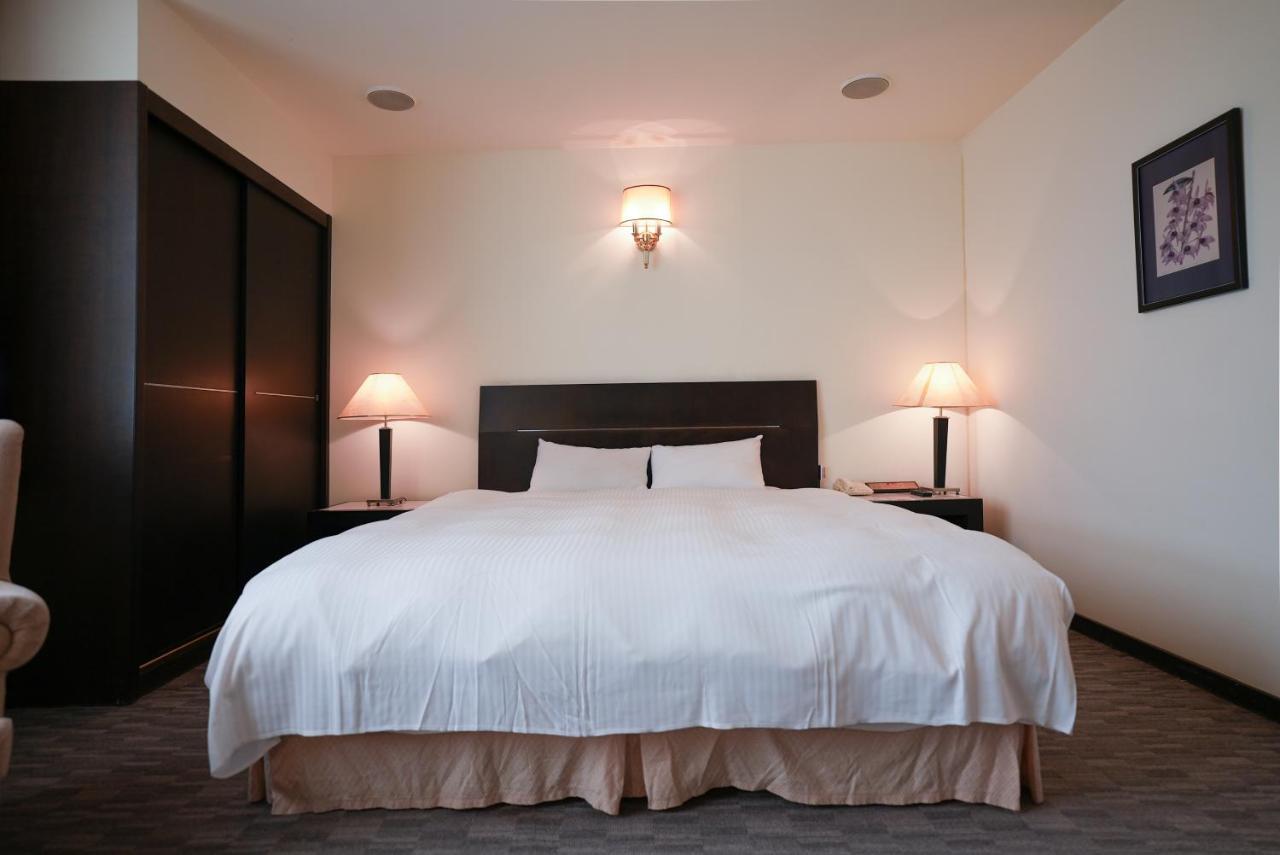 Herkang Hotel Тайчжун Экстерьер фото